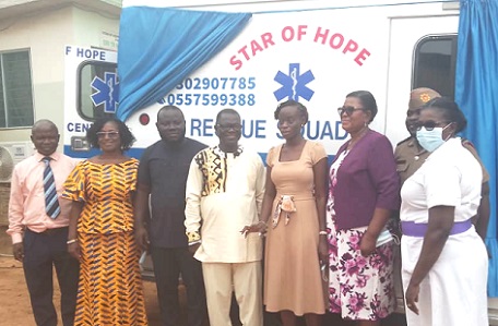    Dr Maame Yaa Nhyira Essel (4th from right), Ga North Director of health, Rev. Benard Asare (4th from left), CEO of Star of Hope Medical Centre and other dignitaries after the commissioning